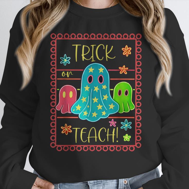 Trick Or Teach Neon Ghost Flower Teacher Spooky Halloween Women Crewneck Sweatshirt, funny design Trick Or Teach Neon Ghost Flower Teacher Spooky Halloween Women Crewneck Sweatshirt, funny design
