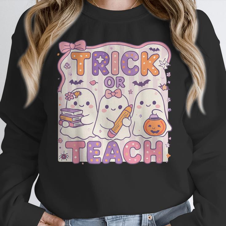 Trick Or Teach Retro Halloween Teacher Look Women Crewneck Sweatshirt, funny design Trick Or Teach Retro Halloween Teacher Look Women Crewneck Sweatshirt, funny design