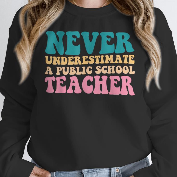 Never Underestimate A Public School Teacher Groovy Women Women Crewneck Sweatshirt, Groovy Teacher Gifts, funny design Never Underestimate A Public School Teacher Groovy Women Women Crewneck Sweatshirt, Groovy Teacher Gifts, funny design