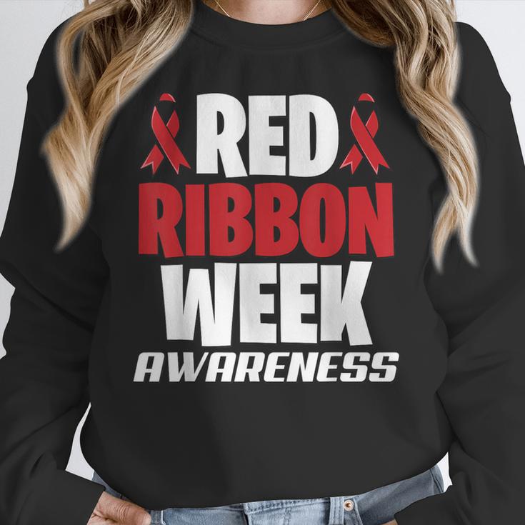 We Wear Red For Red Ribbon Week Awareness Mothers Teachers Women Crewneck Sweatshirt, funny design We Wear Red For Red Ribbon Week Awareness Mothers Teachers Women Crewneck Sweatshirt, funny design