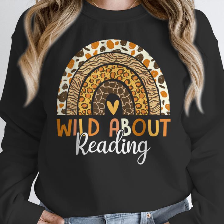 Wild About Reading Teacher Back To School Leopard Rainbow Women Crewneck Sweatshirt, funny design Wild About Reading Teacher Back To School Leopard Rainbow Women Crewneck Sweatshirt, funny design