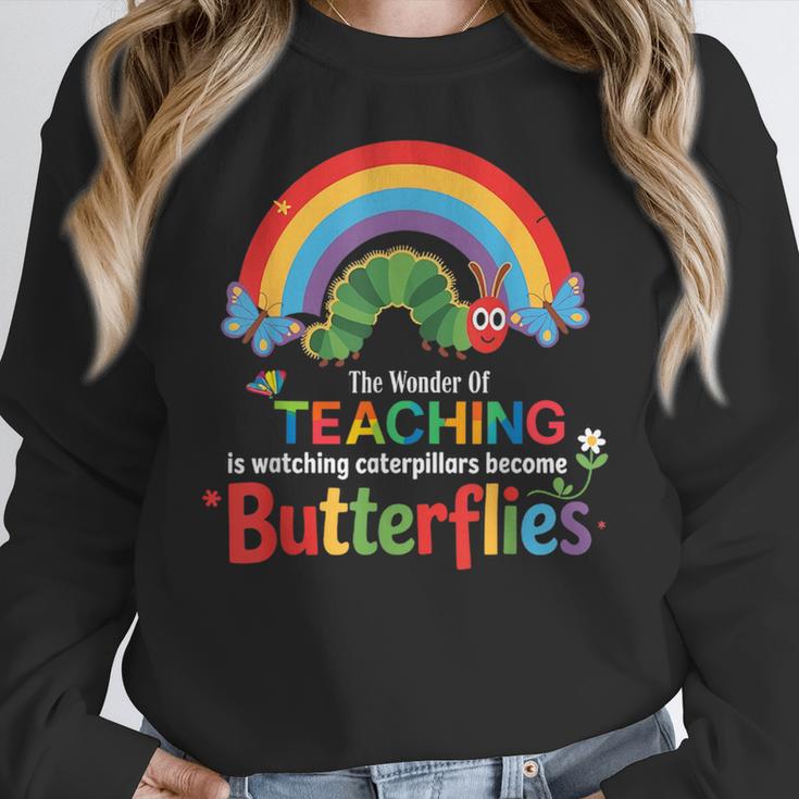 The Wonder Of Teaching Is Watching Caterpillars Teacher Women Crewneck Sweatshirt, funny design The Wonder Of Teaching Is Watching Caterpillars Teacher Women Crewneck Sweatshirt, funny design