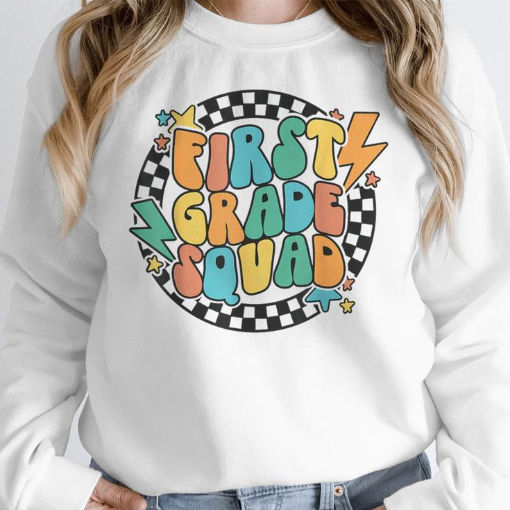 Back To School Groovy Teacher 1st First Grade Crew Squad Women Crewneck Sweatshirt, Groovy Teacher Gifts, First Grade Teacher Gifts, funny design
