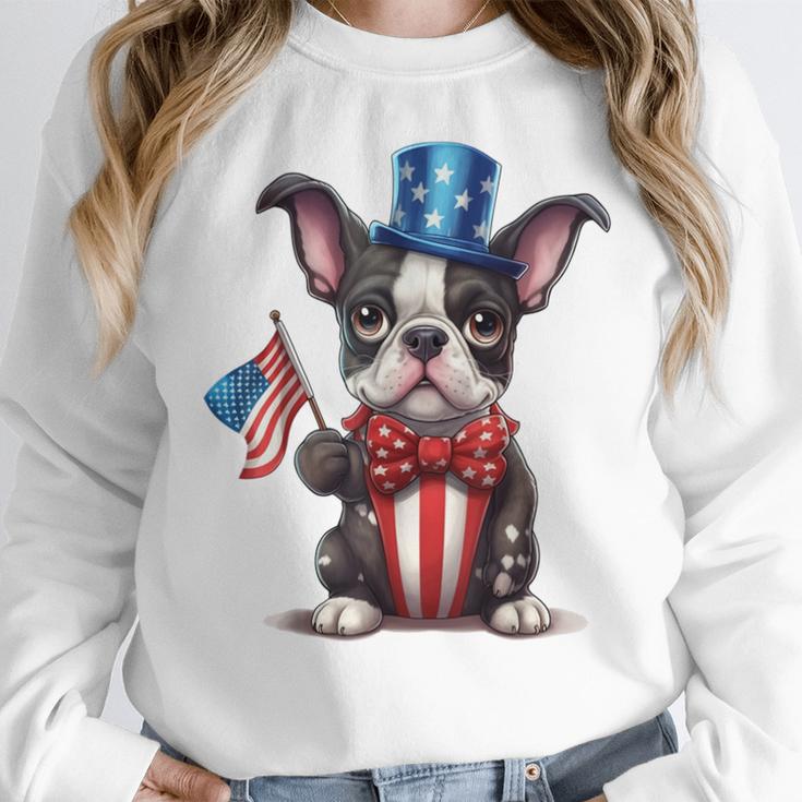 Boston Terrier Puppy Dog Holds His American Flag 4th Of July Women Crewneck Sweatshirt, American Boston Terrier Gifts, Boston Terrier 4th Of July Gifts, funny design