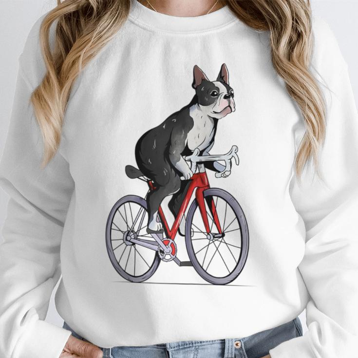 Boston Terrier Riding Bicycle Cute Bostie Biker Raglan Baseball Tee Women Crewneck Sweatshirt, Boston Terrier Riding Gifts, funny design