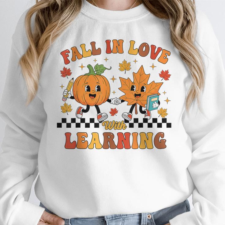 Fall In Love With Learning Teacher Student Autumn Pumpkin Women Crewneck Sweatshirt, funny design Fall In Love With Learning Teacher Student Autumn Pumpkin Women Crewneck Sweatshirt, funny design