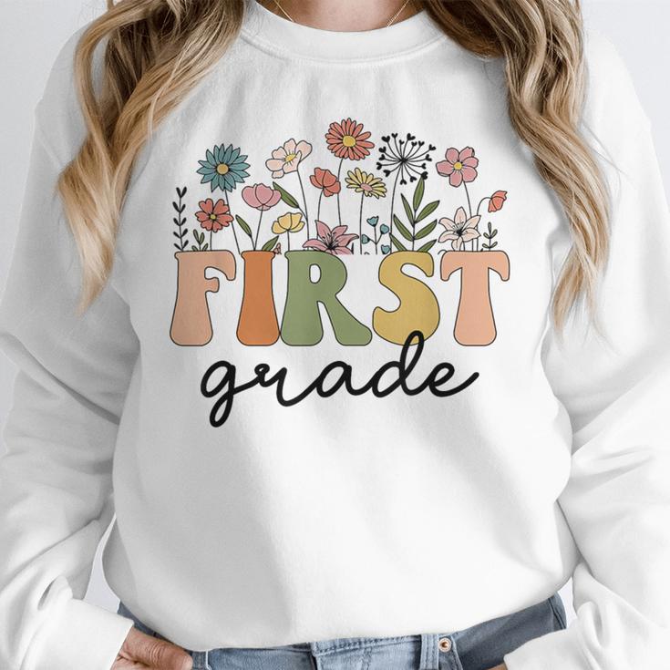 First Grade Teacher Wildflower Back To School Floral Outfits Women Crewneck Sweatshirt, First Grade Teacher Gifts, funny design First Grade Teacher Wildflower Back To School Floral Outfits Women Crewneck Sweatshirt, First Grade Teacher Gifts, funny design