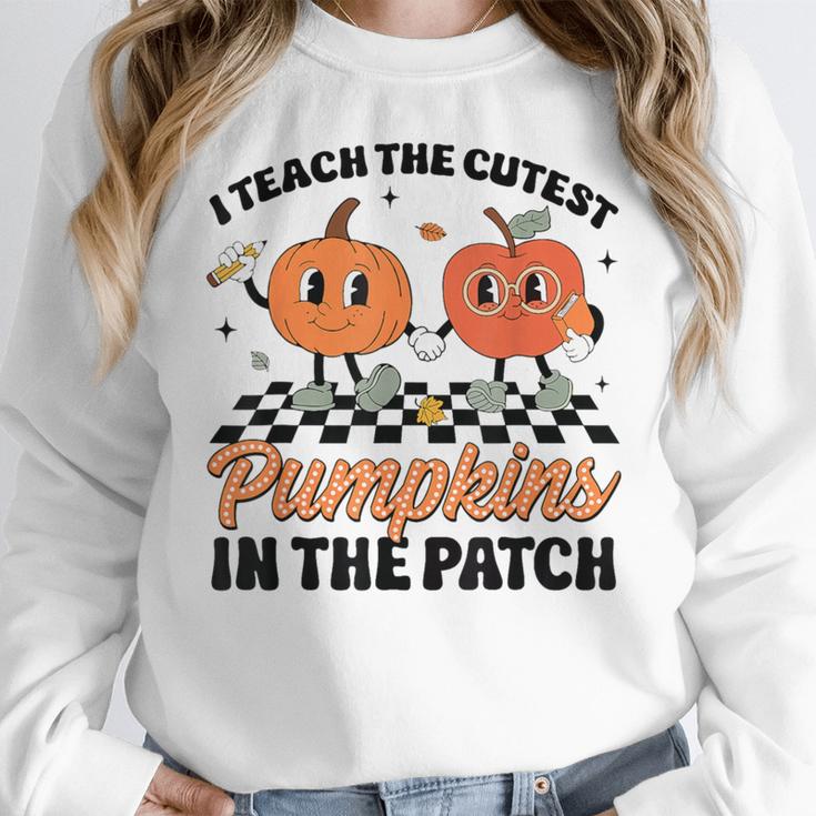 Groovy I Teach The Cutest Pumpkins In The Patch For Teacher Women Crewneck Sweatshirt, Groovy Teacher Gifts, funny design