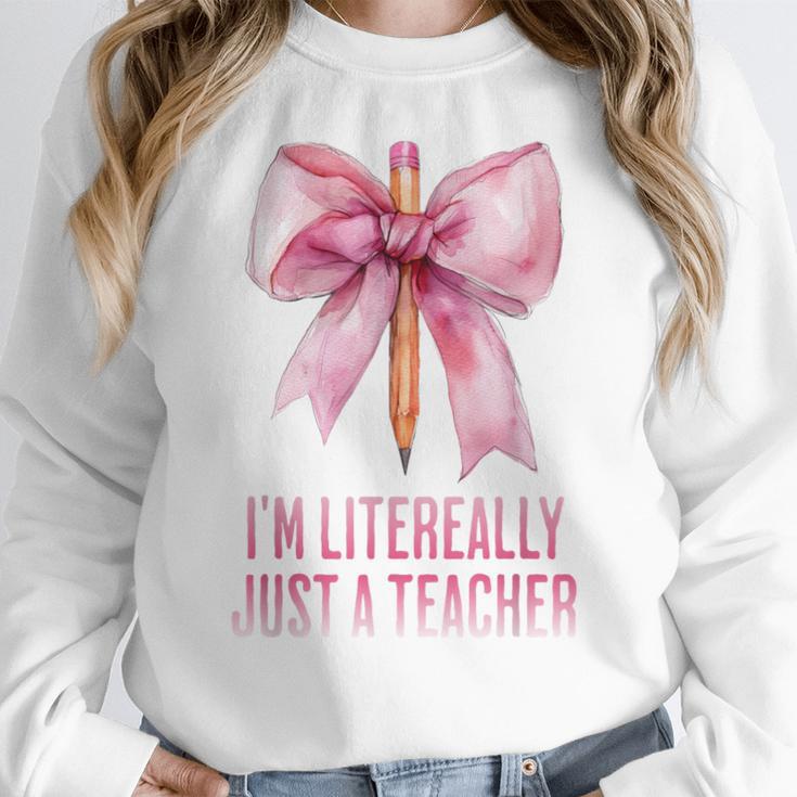 I'm Literally Just a Teacher Pencil Coquette Bow School Women Crewneck Sweatshirt, funny design