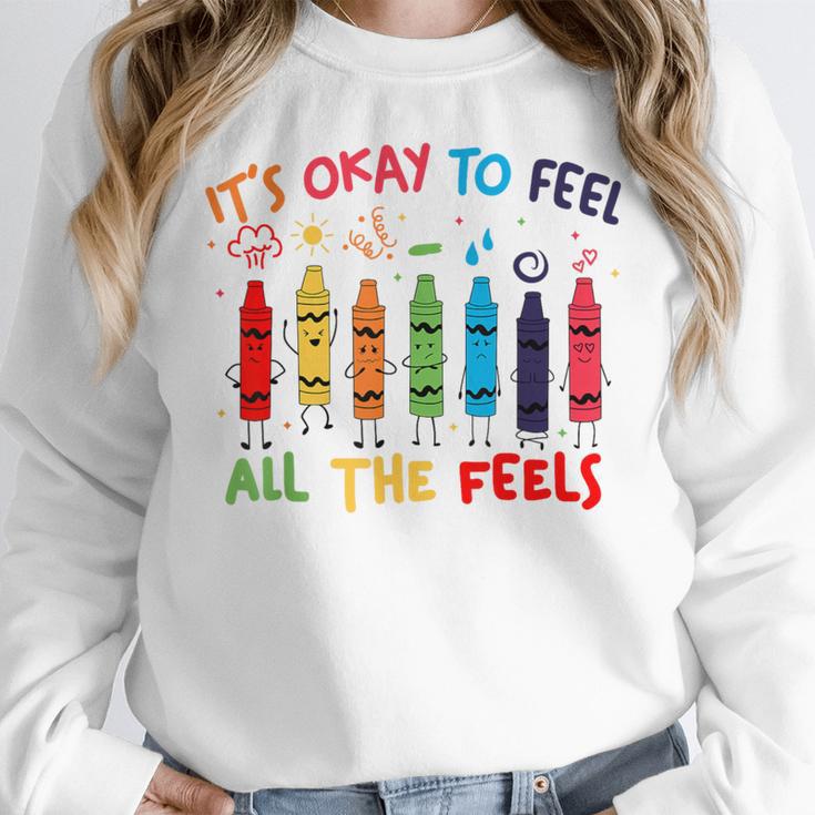 Its Okay To Feel All The Feels Mood Color Crayons Teacher Women Crewneck Sweatshirt, funny design