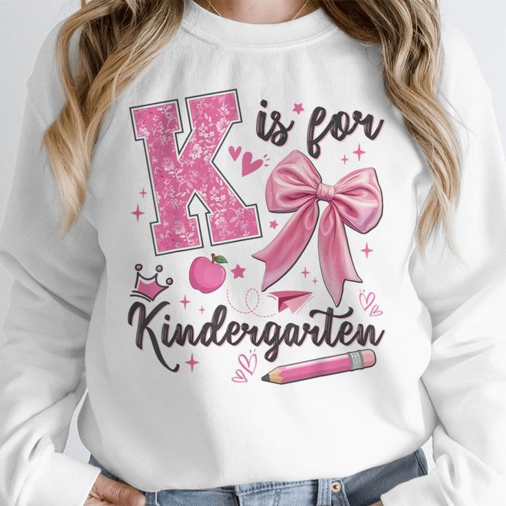 K Is For Kindergarten Teacher Coquette Bow Back To School Women Crewneck Sweatshirt, funny design K Is For Kindergarten Teacher Coquette Bow Back To School Women Crewneck Sweatshirt, funny design
