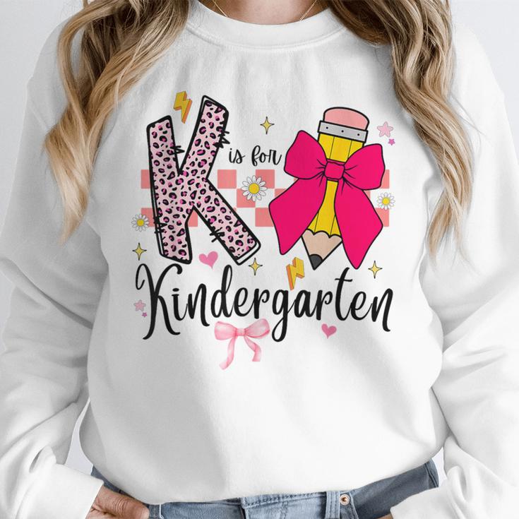 K Is For Kindergarten Teacher Coquette Bow Back To School Women Crewneck Sweatshirt, funny design K Is For Kindergarten Teacher Coquette Bow Back To School Women Crewneck Sweatshirt, funny design