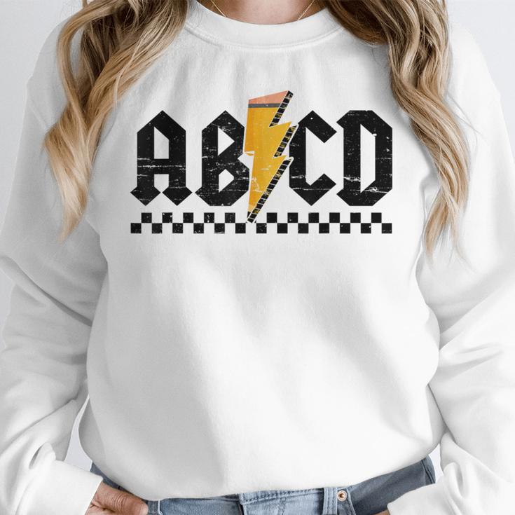 Lightning Pencil Rock'n Roll ABCD Teacher Back To School Kid Women Crewneck Sweatshirt, funny design Lightning Pencil Rock'n Roll ABCD Teacher Back To School Kid Women Crewneck Sweatshirt, funny design