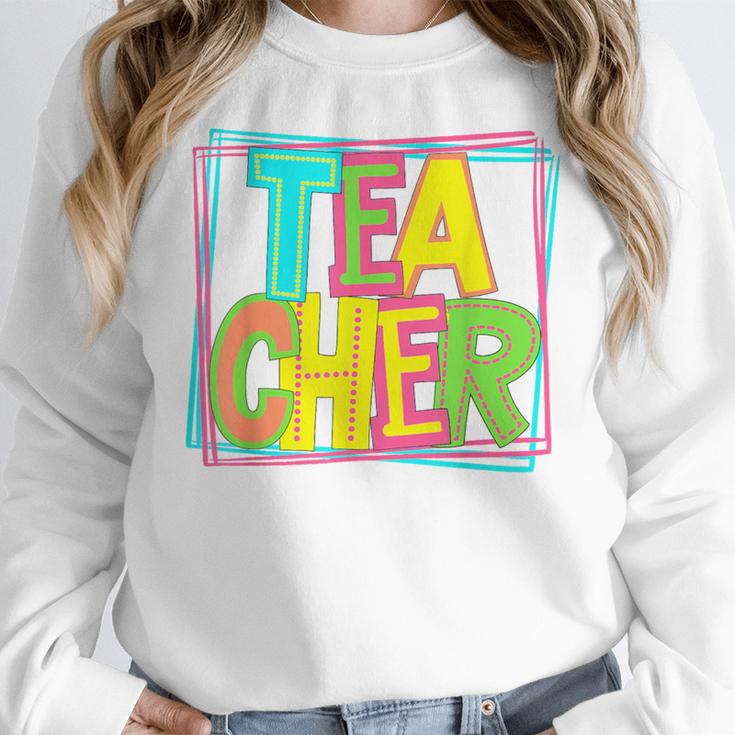 Neon Retro Teacher Cute Teacher Team New Teacher Back To Sch Women Crewneck Sweatshirt, funny design Neon Retro Teacher Cute Teacher Team New Teacher Back To Sch Women Crewneck Sweatshirt, funny design