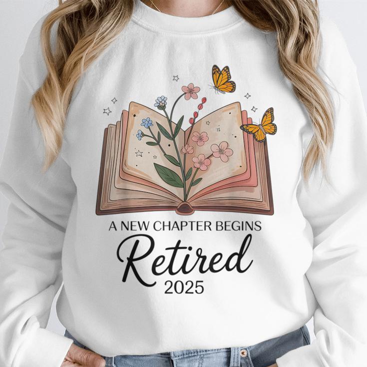Retired 2025 A New Chapter Begins Retirement Teacher Book Women Crewneck Sweatshirt, funny design Retired 2025 A New Chapter Begins Retirement Teacher Book Women Crewneck Sweatshirt, funny design