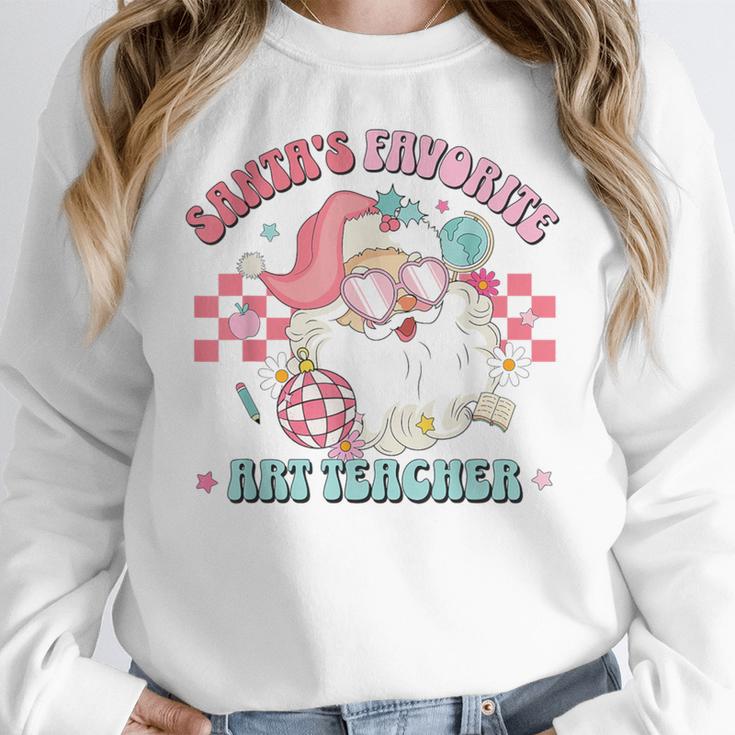 Retro Pink Christmas Santa's Favorite Art Teacher Artist Women Crewneck Sweatshirt, funny design Retro Pink Christmas Santa's Favorite Art Teacher Artist Women Crewneck Sweatshirt, funny design
