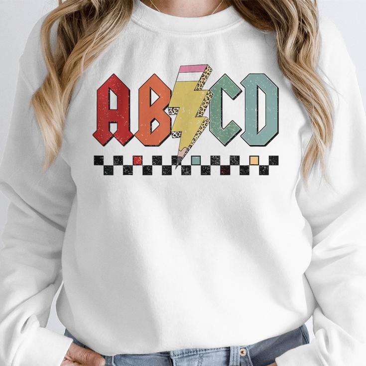 Rock Abcd Back To School Abcd Preschool Teacher Appreciation Women Crewneck Sweatshirt, funny design Rock Abcd Back To School Abcd Preschool Teacher Appreciation Women Crewneck Sweatshirt, funny design