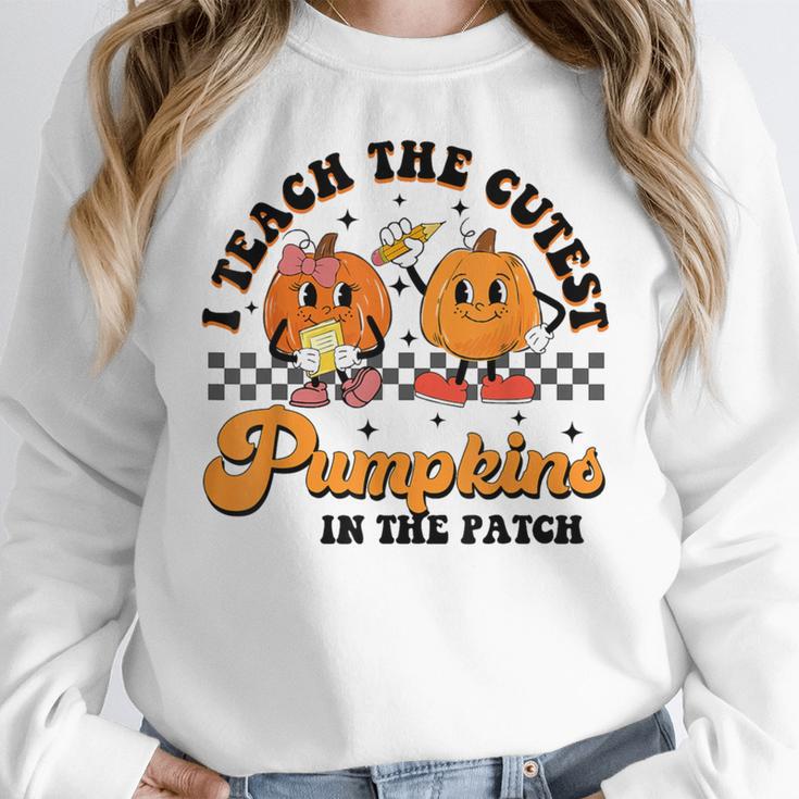 I Teach The Cutest Pumpkins In The Patch Halloween Teacher For Men Women Kids Women Crewneck Sweatshirt, funny design