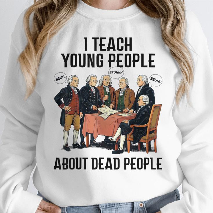 I Teach Young People About Dead-People History Teachers Women Crewneck Sweatshirt, History Teacher Gifts, funny design I Teach Young People About Dead-People History Teachers Women Crewneck Sweatshirt, History Teacher Gifts, funny design
