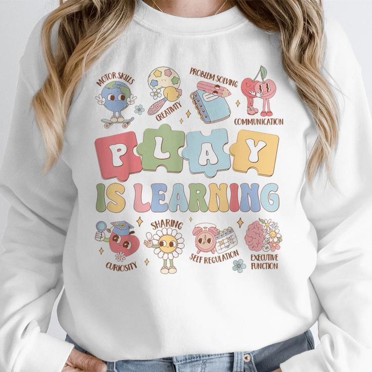 Teacher Groovy Play Is Learning Back To School Women Crewneck Sweatshirt, Groovy Teacher Gifts, funny design Teacher Groovy Play Is Learning Back To School Women Crewneck Sweatshirt, Groovy Teacher Gifts, funny design