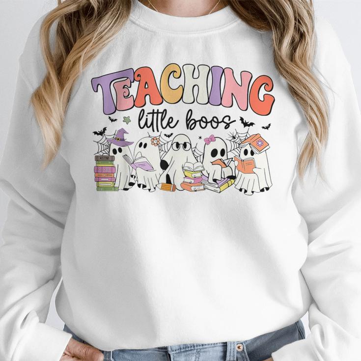 Teaching My Little Boos Teacher Ghost Teacher Halloween For Men Women Kids Women Crewneck Sweatshirt, funny design Teaching My Little Boos Teacher Ghost Teacher Halloween For Men Women Kids Women Crewneck Sweatshirt, funny design