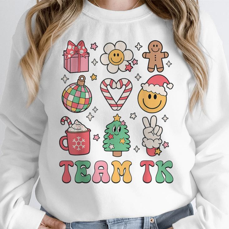 Team TK Teacher Christmas Groovy Smile Face Girl Boy Kid TK Women Crewneck Sweatshirt, Groovy Teacher Gifts, funny design Team TK Teacher Christmas Groovy Smile Face Girl Boy Kid TK Women Crewneck Sweatshirt, Groovy Teacher Gifts, funny design