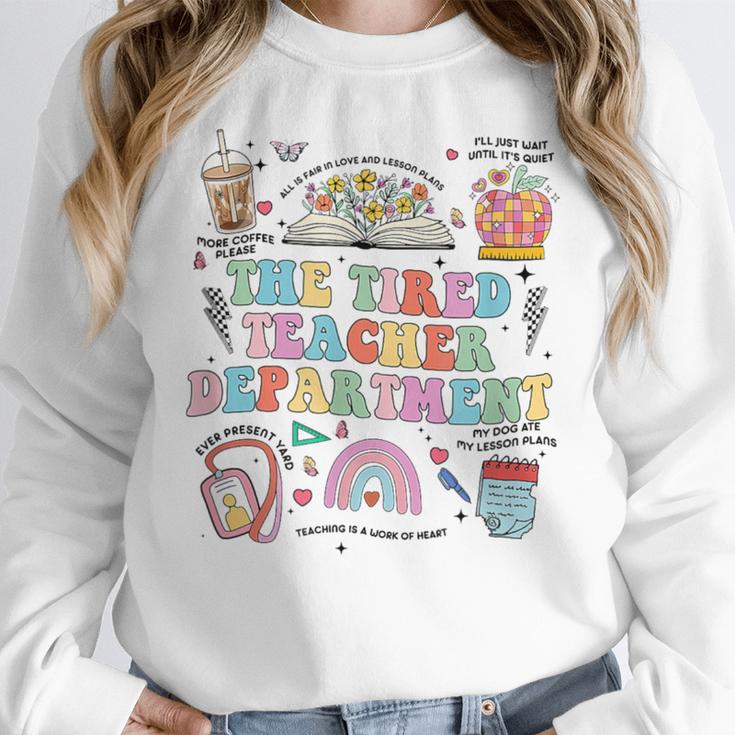 The Tired Teachers Department Retro Groovy Back To School Women Crewneck Sweatshirt, funny design
