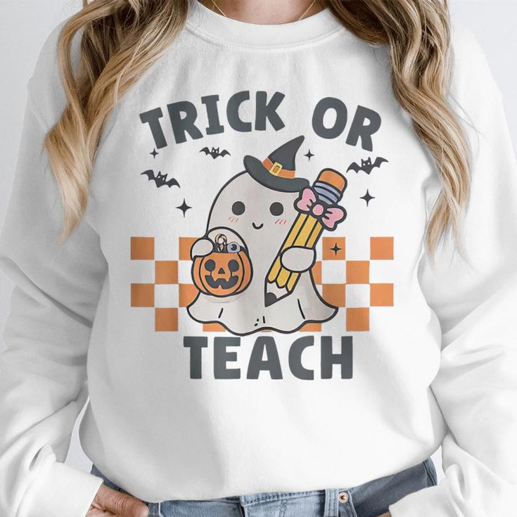 Trick Or Teach Teacher Women Crewneck Sweatshirt, funny design Trick Or Teach Teacher Women Crewneck Sweatshirt, funny design