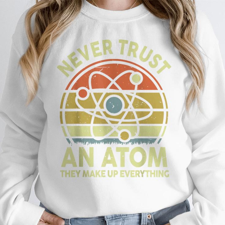 Never Trust An Atom Physics Jokes Science Teacher Women Crewneck Sweatshirt, Science Teacher Gifts, funny design Never Trust An Atom Physics Jokes Science Teacher Women Crewneck Sweatshirt, Science Teacher Gifts, funny design