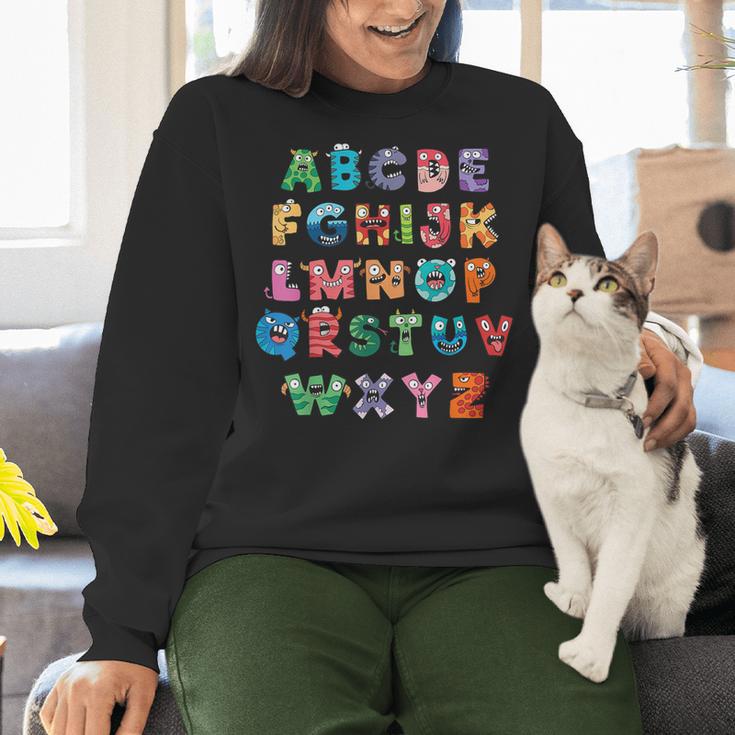 ABC Cute Monster Alphabet Halloween Teacher Costume Kids Women Crewneck Sweatshirt, gift for family, gift for coworker