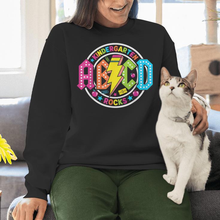 ABCD Kindergarten Rocks Back To School Teachers Students Women Crewneck Sweatshirt, gift for family, gift for coworker ABCD Kindergarten Rocks Back To School Teachers Students Women Crewneck Sweatshirt, gift for family, gift for coworker