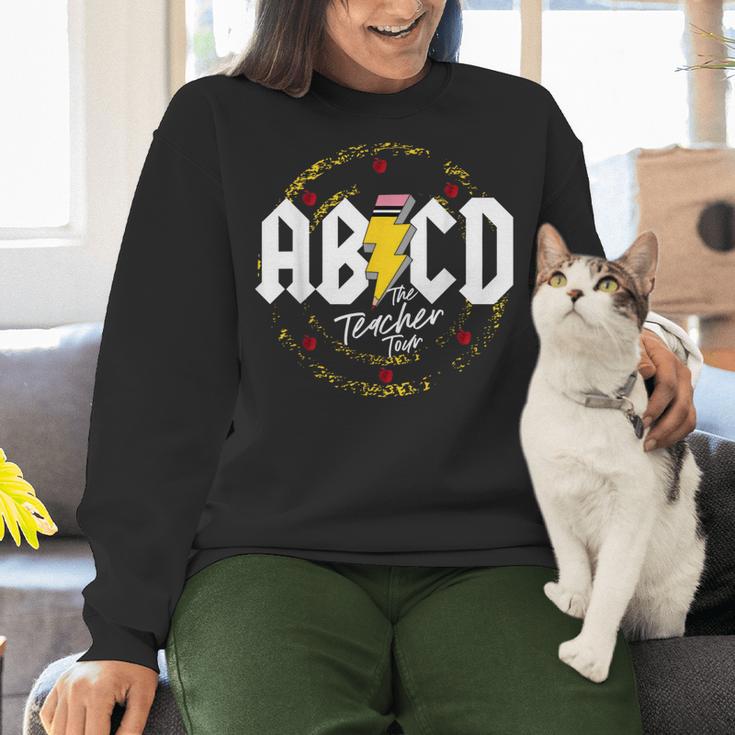 ABCD The Teacher Tour Last Day Of School Rockin' Teacher Women Crewneck Sweatshirt, gift for family, gift for coworker ABCD The Teacher Tour Last Day Of School Rockin' Teacher Women Crewneck Sweatshirt, gift for family, gift for coworker