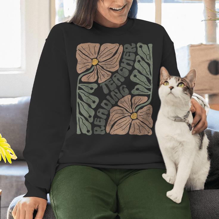 Boho Floral Reading Teacher Retro Reading Specialist Wildfl Women Crewneck Sweatshirt, gift for family, gift for coworker Boho Floral Reading Teacher Retro Reading Specialist Wildfl Women Crewneck Sweatshirt, gift for family, gift for coworker