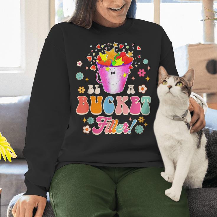 Be A Bucket Filler Teacher Teaching Groovy Back To School For Men Women Women Crewneck Sweatshirt, Groovy Teacher Sweatshirts, gift for family, gift for coworker Be A Bucket Filler Teacher Teaching Groovy Back To School For Men Women Women Crewneck Sweatshirt, Groovy Teacher Sweatshirts, gift for family, gift for coworker