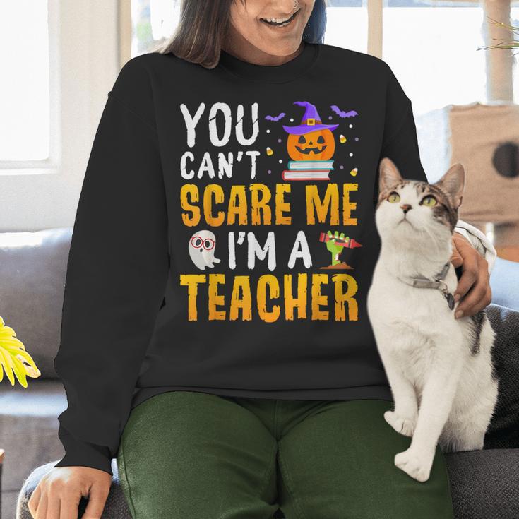You Cant Scare Me Im A Teacher Halloween Trick Or Teach 2024 Women Crewneck Sweatshirt, gift for family, gift for coworker