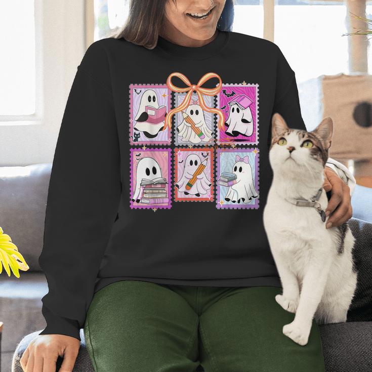 Coquette Bow Spooky Teacher Ghost Halloween Trick Or Teach Women Crewneck Sweatshirt, gift for family, gift for coworker Coquette Bow Spooky Teacher Ghost Halloween Trick Or Teach Women Crewneck Sweatshirt, gift for family, gift for coworker