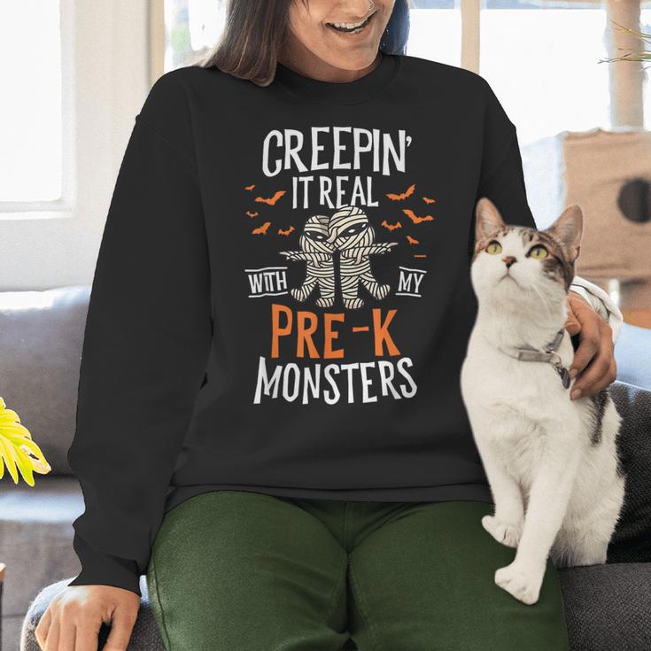 Creepin It Real Pre-K Monsters Halloween Preschool Teacher Women Crewneck Sweatshirt, gift for family, gift for coworker