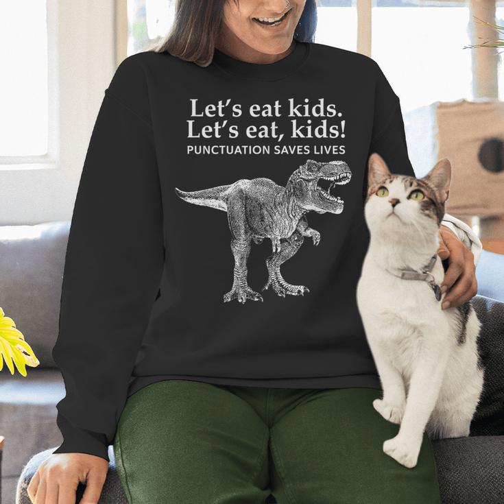 Lets Eat Kids Punctuation Saves Lives Dinosaur Teacher Women Crewneck Sweatshirt, gift for family, gift for coworker