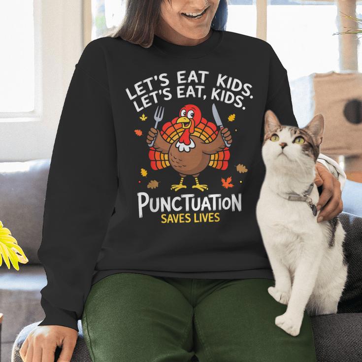 Lets Eat Kids Punctuation Saves Lives Thanksgiving Teacher Women Crewneck Sweatshirt, gift for family, gift for coworker