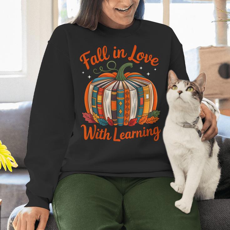 Fall In Love With Learning Book Lover Autumn Pumpkin Teacher Women Crewneck Sweatshirt, gift for family, gift for coworker Fall In Love With Learning Book Lover Autumn Pumpkin Teacher Women Crewneck Sweatshirt, gift for family, gift for coworker