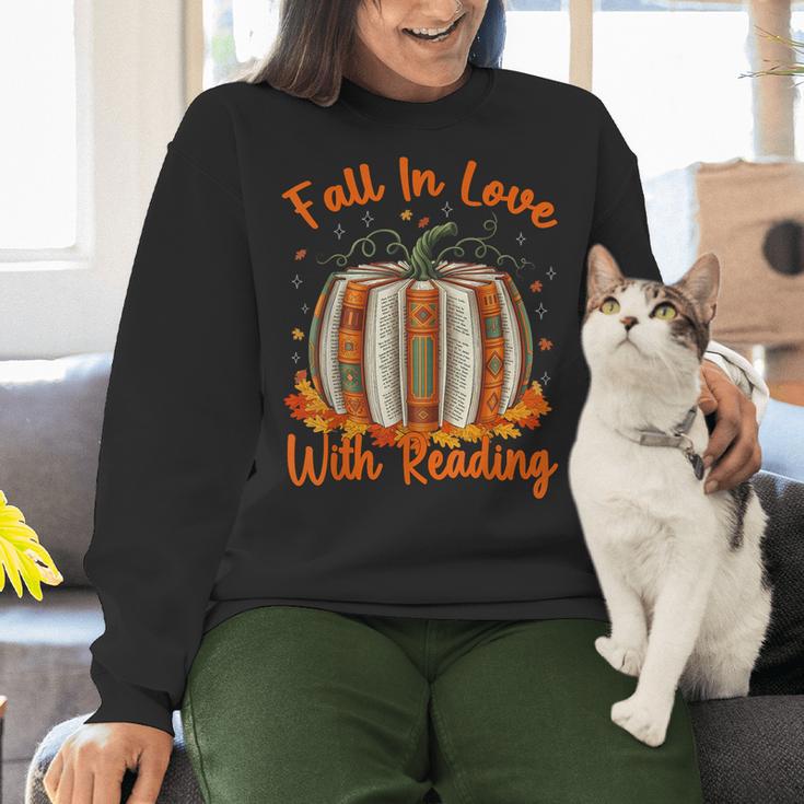 Fall In Love With Reading Pumpkin Autumn Librarians Teacher Women Crewneck Sweatshirt, gift for family, gift for coworker Fall In Love With Reading Pumpkin Autumn Librarians Teacher Women Crewneck Sweatshirt, gift for family, gift for coworker
