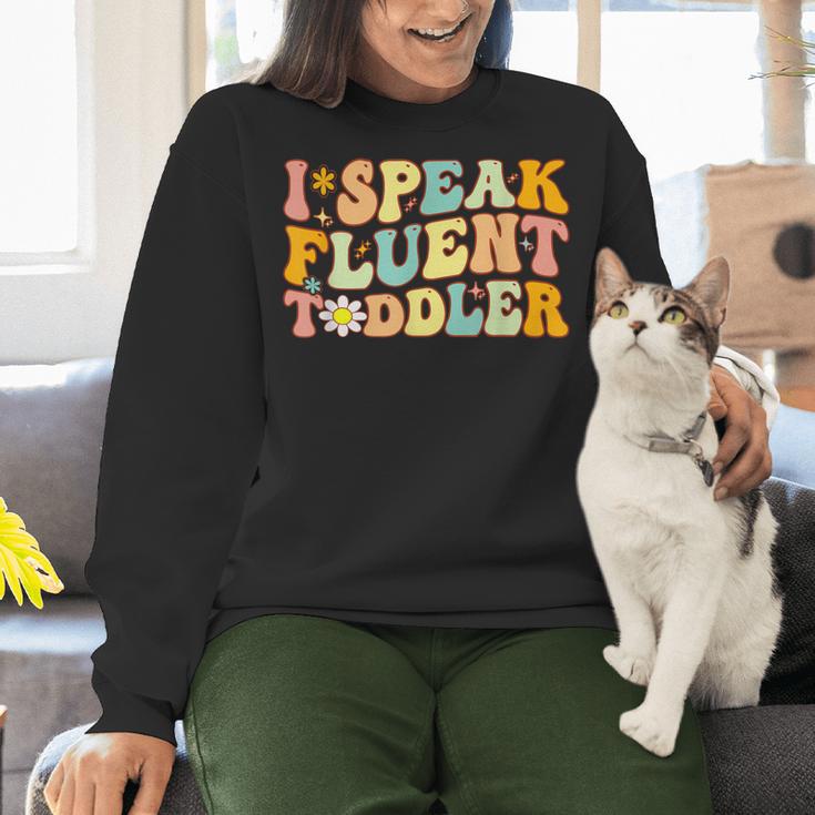 Groovy I Speak Fluent Toddler Daycare Provider Teacher Women Crewneck Sweatshirt, Groovy Teacher Sweatshirts, gift for family, gift for coworker