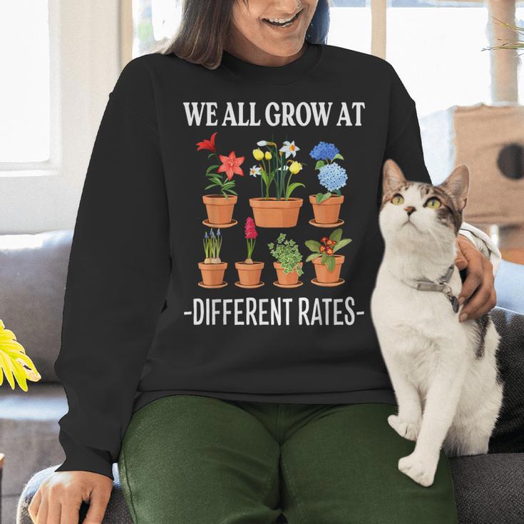 We All Grow At Different Rates Back To School Teacher Women Crewneck Sweatshirt, gift for family, gift for coworker