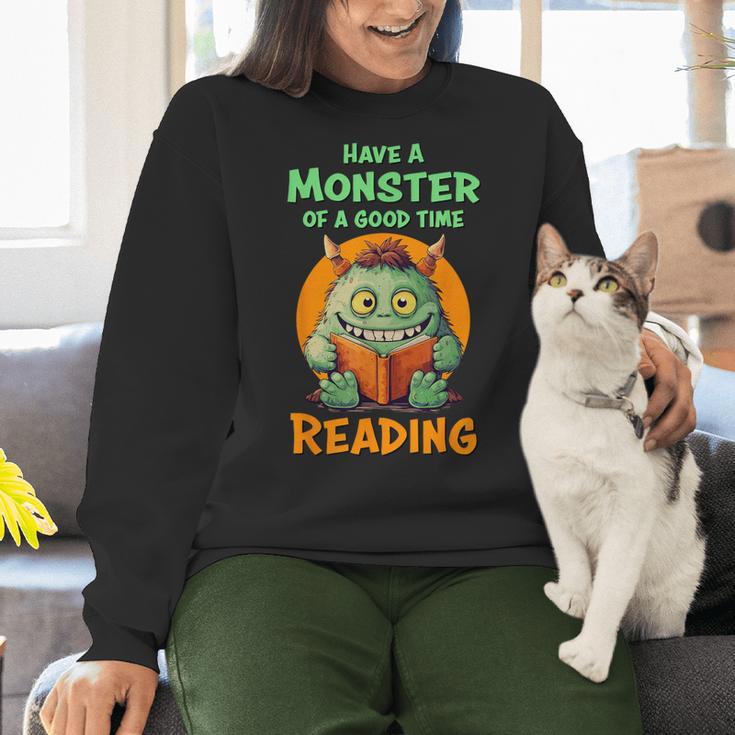 Halloween Teacher Librarian Monster Reading Books Men Women Kids Women Crewneck Sweatshirt, gift for family, gift for coworker