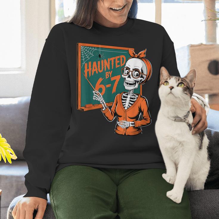 Haunted By 6-7 Six Seven 67 Math Teacher Halloween Skeleton Women Crewneck Sweatshirt, gift for family, gift for coworker