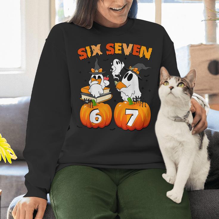 Haunted By 67 Boo Ghost Pumpkin Halloween Teacher Women Crewneck Sweatshirt, gift for family, gift for coworker Haunted By 67 Boo Ghost Pumpkin Halloween Teacher Women Crewneck Sweatshirt, gift for family, gift for coworker