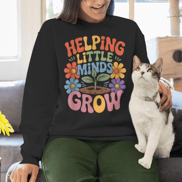 Helping Little Minds Grow Teacher First Day Back To School Women Crewneck Sweatshirt, gift for family, gift for coworker Helping Little Minds Grow Teacher First Day Back To School Women Crewneck Sweatshirt, gift for family, gift for coworker
