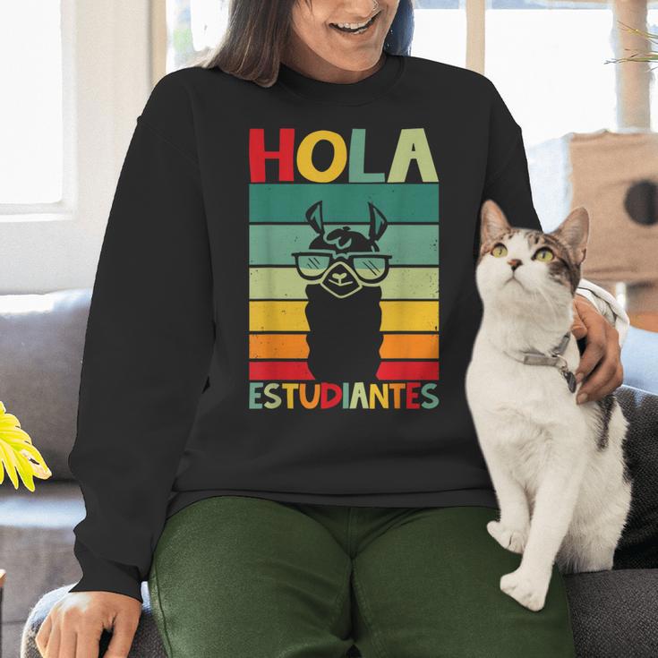 Hola Estudiantes Spanish Teacher Back To School 2025 Women Crewneck Sweatshirt, gift for family, gift for coworker Hola Estudiantes Spanish Teacher Back To School 2025 Women Crewneck Sweatshirt, gift for family, gift for coworker
