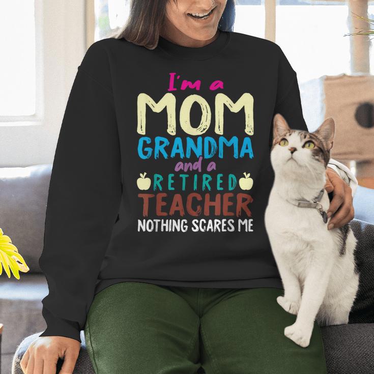 I'm Mom Grandma And A Retired Teacher Nothing Scares Me Men Women Women Crewneck Sweatshirt, gift for family, gift for coworker I'm Mom Grandma And A Retired Teacher Nothing Scares Me Men Women Women Crewneck Sweatshirt, gift for family, gift for coworker