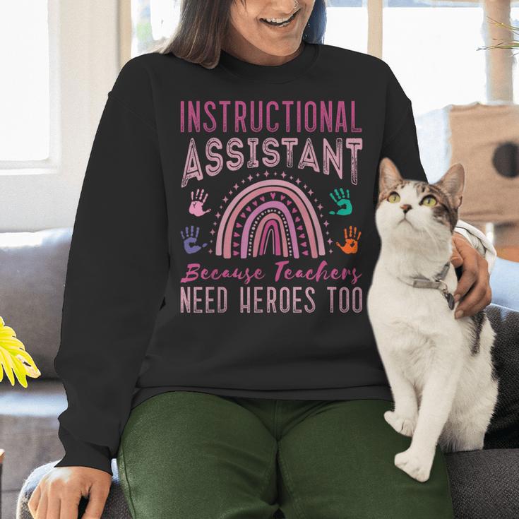 Instructional Assistant Because Teacher Need Hero Learning Women Crewneck Sweatshirt, gift for family, gift for coworker